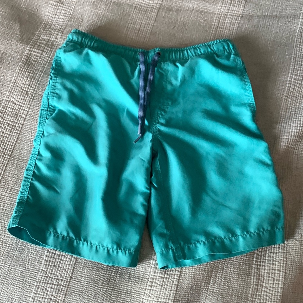 Kids size 8 Johnnie-O blue-green swim trunks good condition